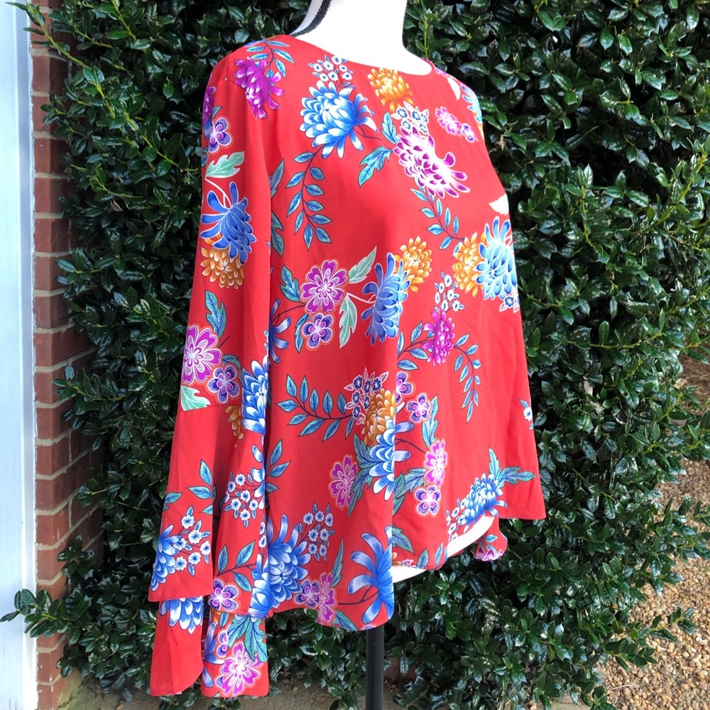 Beautiful floral top with detailed sleeves